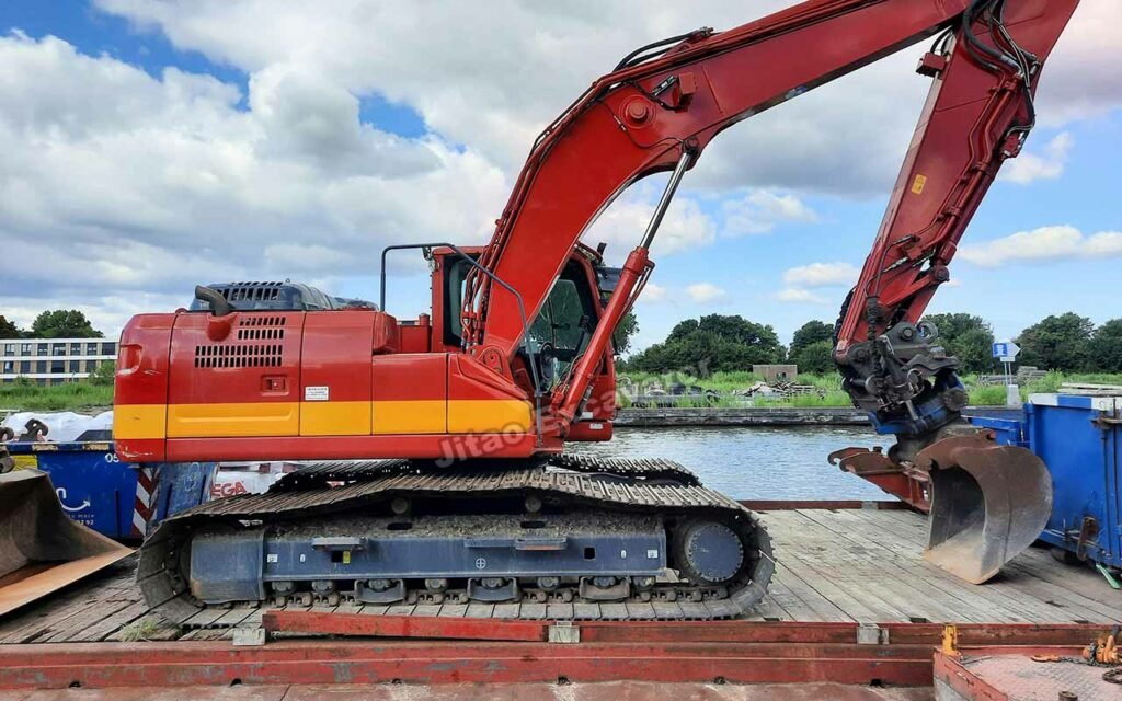Inspecting high-performance used excavator before shipping
