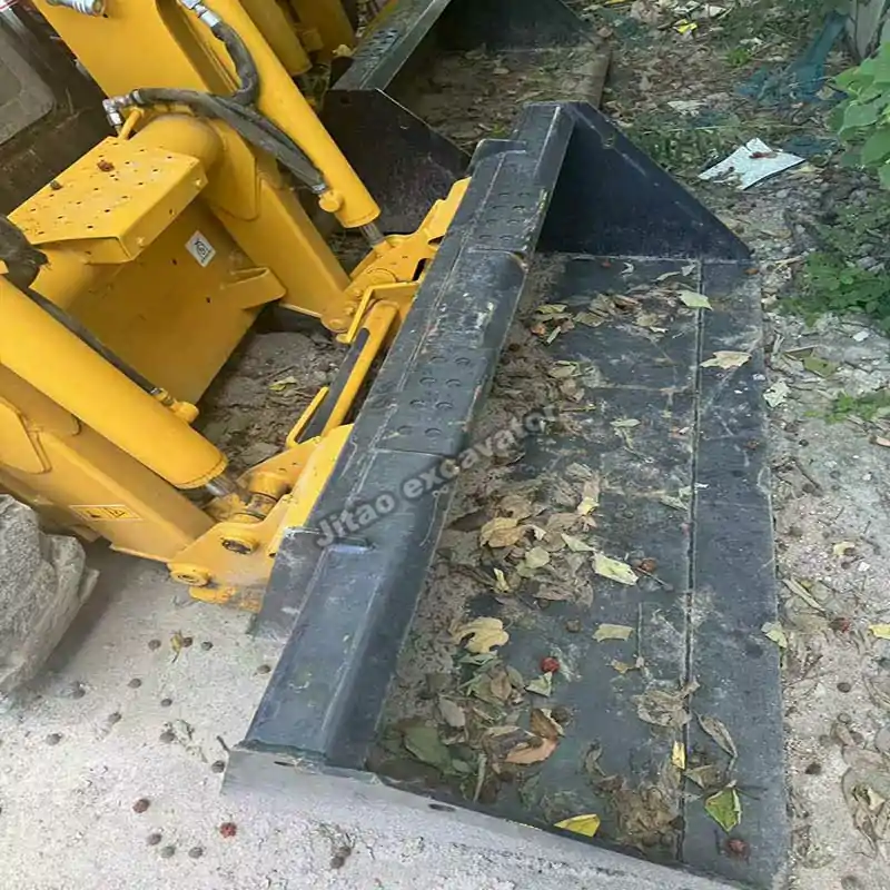 Detail view of the heavy-duty bucket on a used bulldozers for sale model.