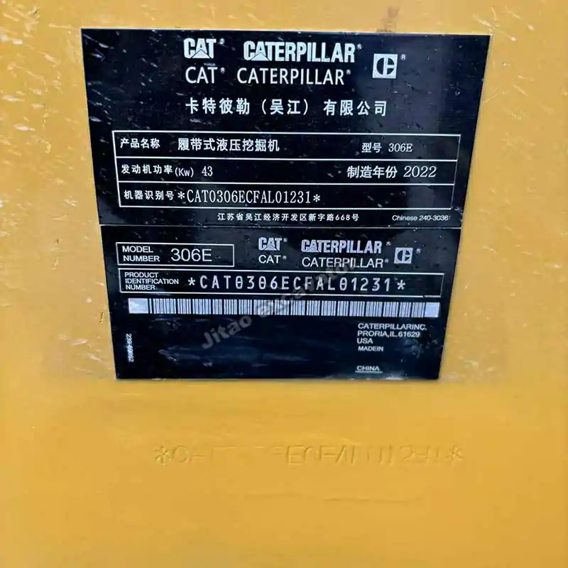 Authentic specifications plate and serial number of Caterpillar 306 excavator.