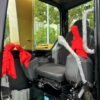 Comfortable cabin interior of a CAT 308E2 used compact excavator for sale.