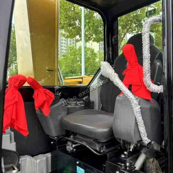 Comfortable cabin interior of a CAT 308E2 used compact excavator for sale.