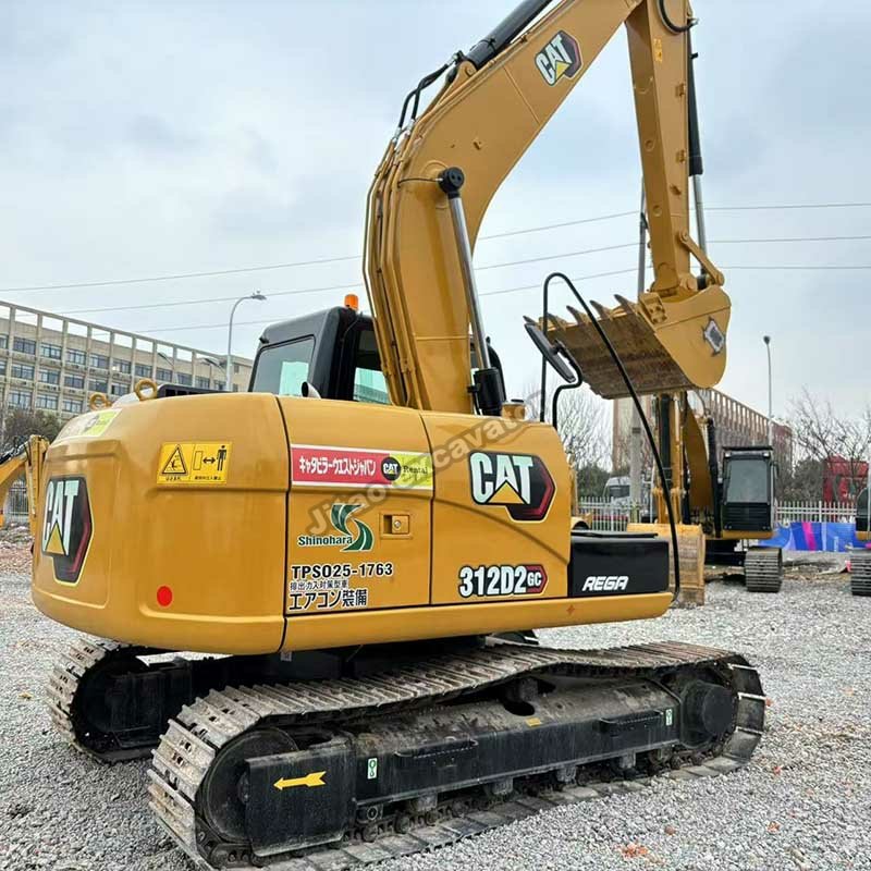 Side view of a Cat 312D2 GC available through our used excavator sales near me network.
