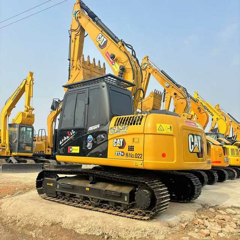 Side view of a yellow Cat 312 GC available in our used digger sales yard.
