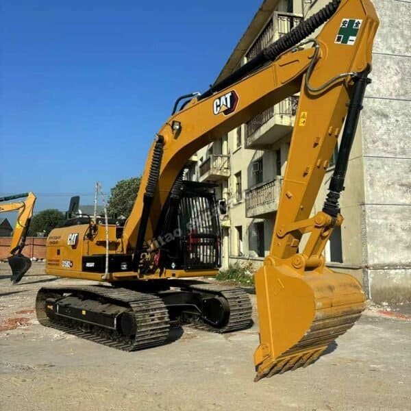 Cat 315D2 Full Profile Side view of Cat 315D2, a heavy-duty alternative to a tractor post hole digger used for farming.