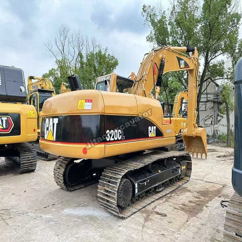 Rear angle of the Cat 320CL excavator showing original counterweight.