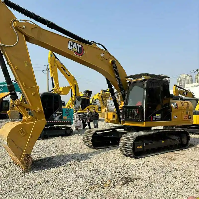 Side view of a Cat 320GX, a modern choice for used excavators for sale.