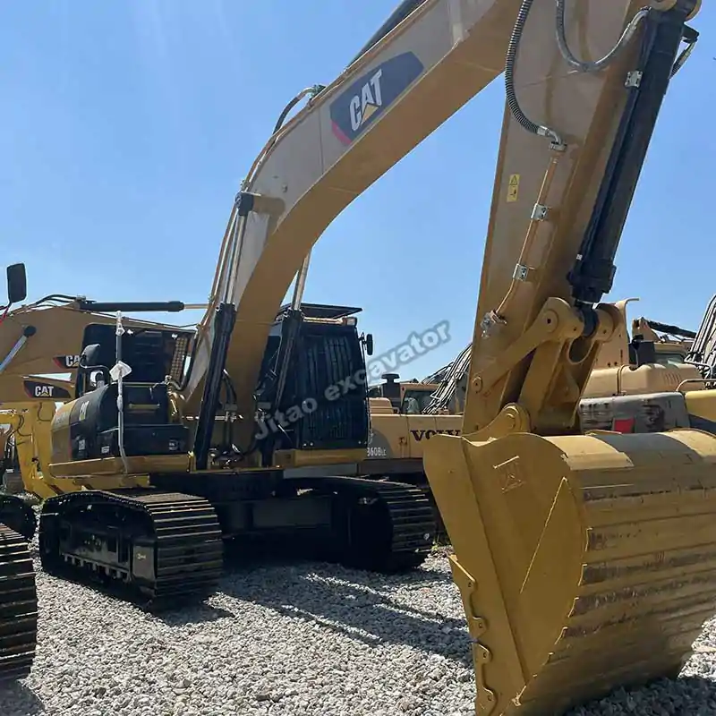 Front side view of a Cat 336D2L, part of our premium excavators for sale used.