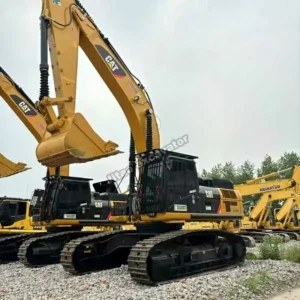 Front side view of a Cat 340DL, part of our premium used excavator sales.