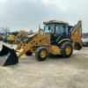 Side profile of a verified CAT 420F backhoe loader at Jitao yard.