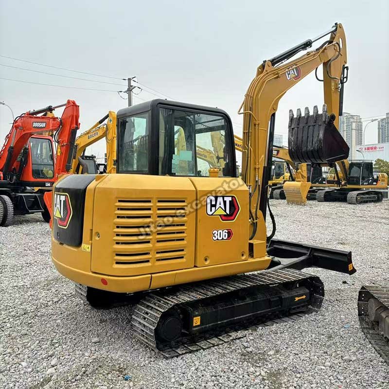 Rear view showing the undercarriage of CAT 306 mini excavators for sale used.