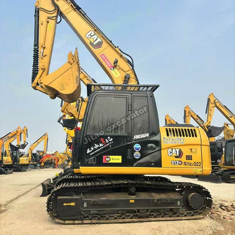 Side profile of the Cat 312 GC showing the hydraulic boom and bucket.