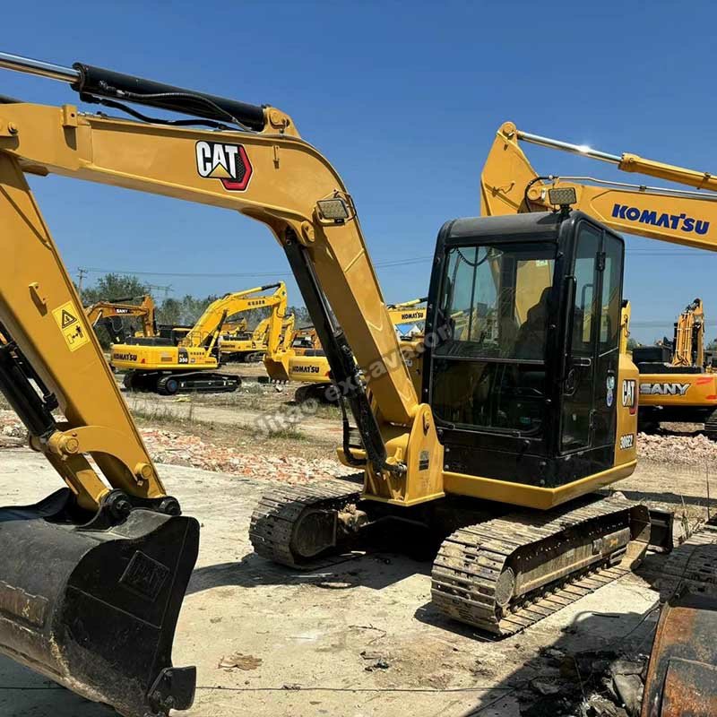 Close-up side view showing tracks of CAT 306E2 used excavators.