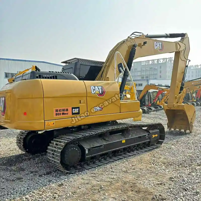 Rear angle view of the Cat 320GX excavator showing the engine bay.