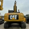 Cat 323D2L Rear View Rear view of the Cat 323D2L showing the counterweight and CAT branding.