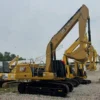 Next-Gen Excavator Design Full side view of Cat 330GC featuring its specialized bucket design.