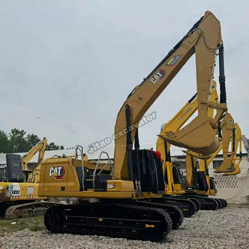 Full side view of Cat 330GC featuring its specialized bucket design.