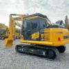 Perspective view of PC130, ideal for buyers seeking a used mini excavator for sale near me.