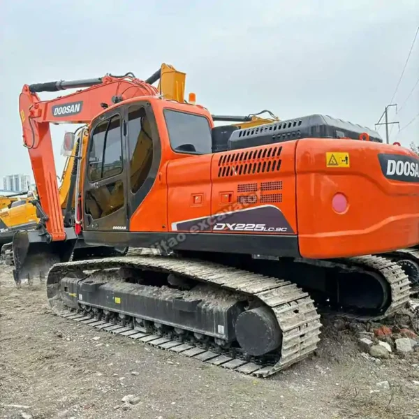 Robust Rear Design Rear angle of the Doosan DX225LC-9C, highlighting its clean exterior.