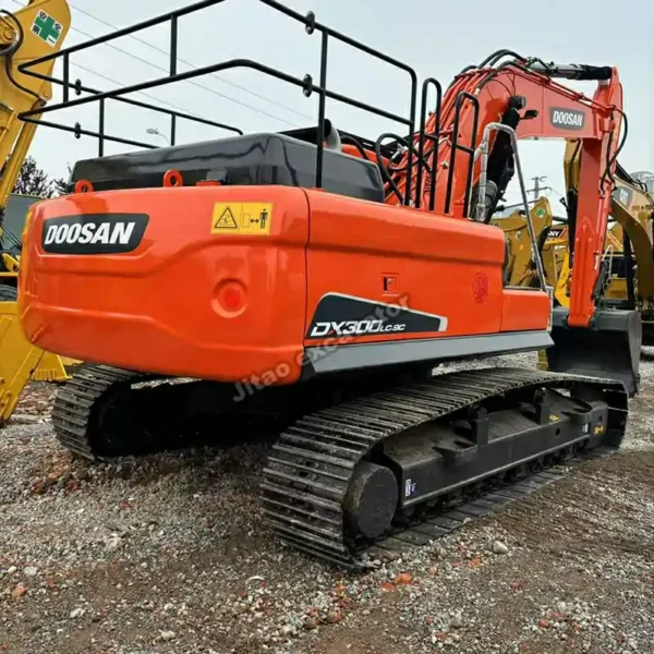Rear view of the Doosan DX300 showing safety rails and upper structure integrity.