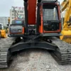 Front perspective of a Doosan DX300 available in our used excavators sale.