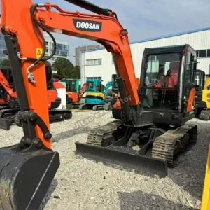 Front view of a Doosan DX60 for buyers seeking used mini excavators for sale near me by owner.