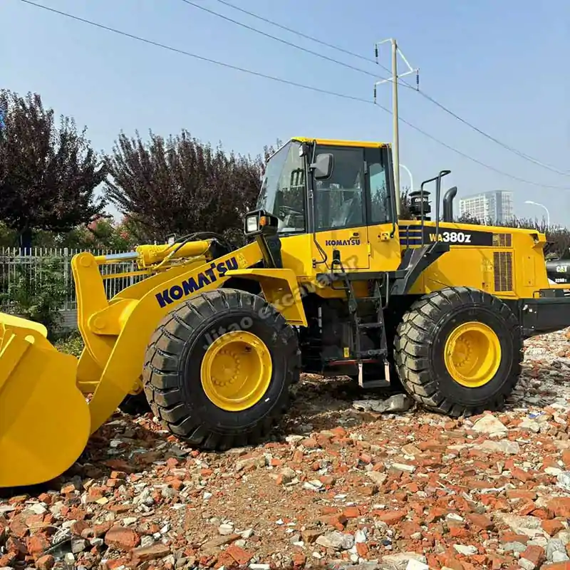 Left exterior view of a durable used mini bulldozer for sale.