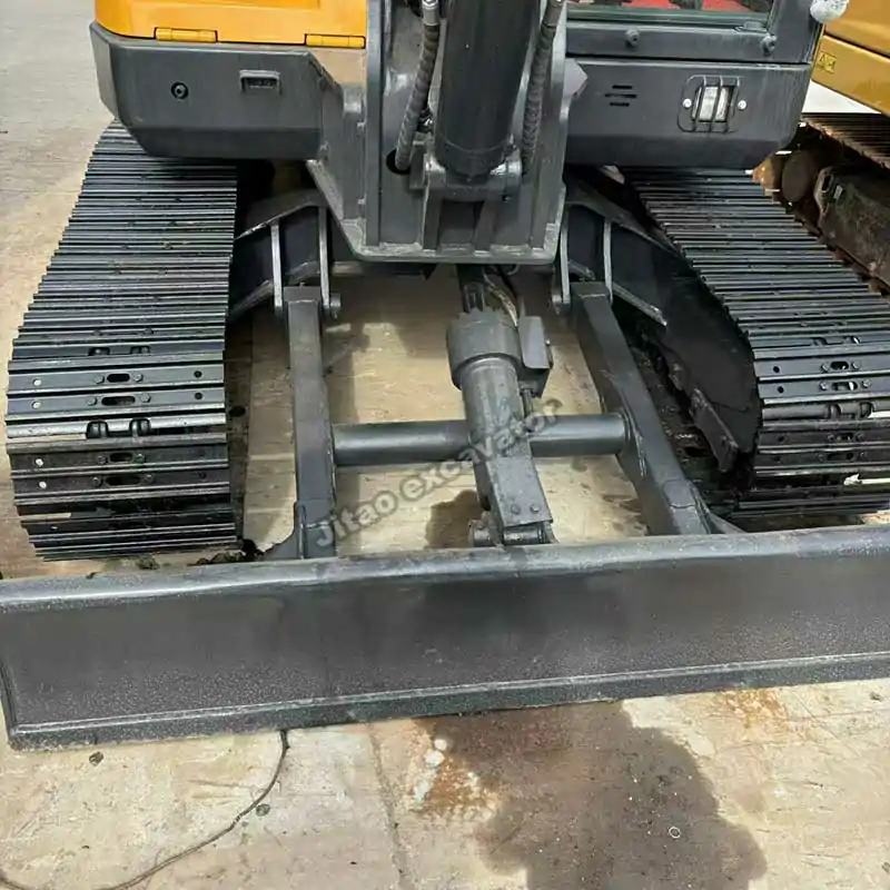 Underbody and blade detail of EC60D. Fair used excavator price guaranteed.