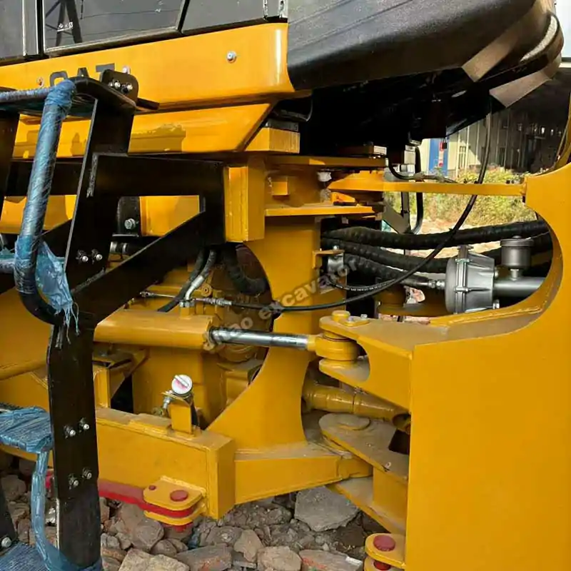 Detailed view of the heavy-duty bucket on a used front end loader.