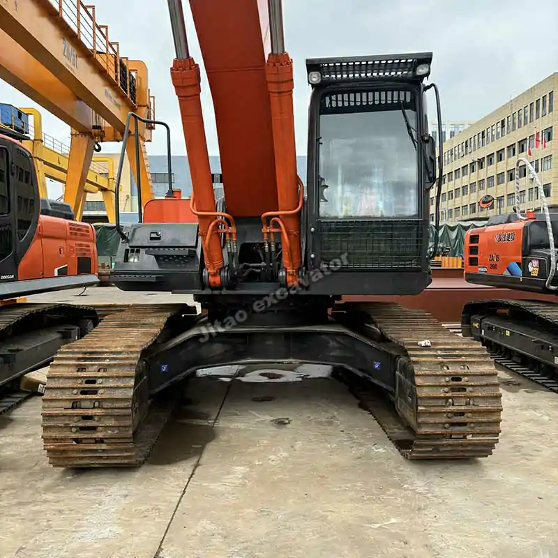 Hydraulic used excavator thumb detail on a Hitachi machine.
