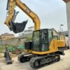 CAT 307.5 Side View Side profile view of a certified CAT 307.5 used mini excavator.