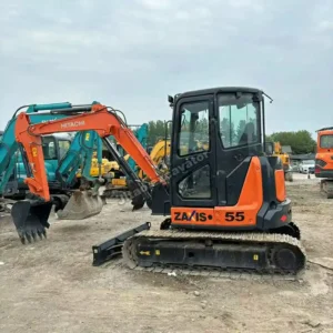 Hitachi 55 Machine Body Side perspective of the used mini excavator near me at our yard.
