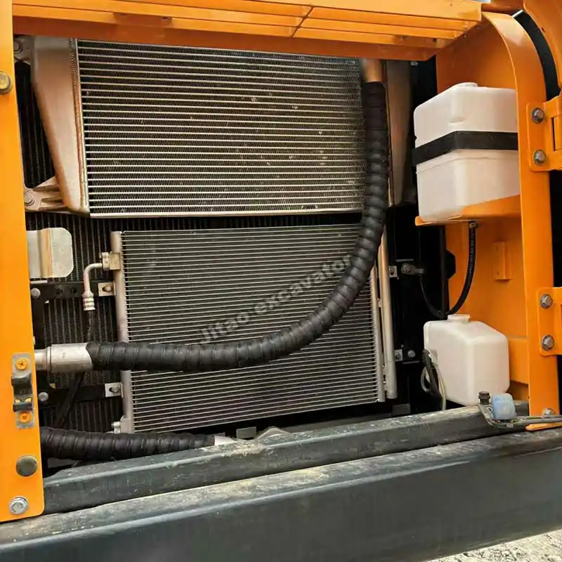 Detailed view of the engine cooling block. Reliable hyundai excavator power.