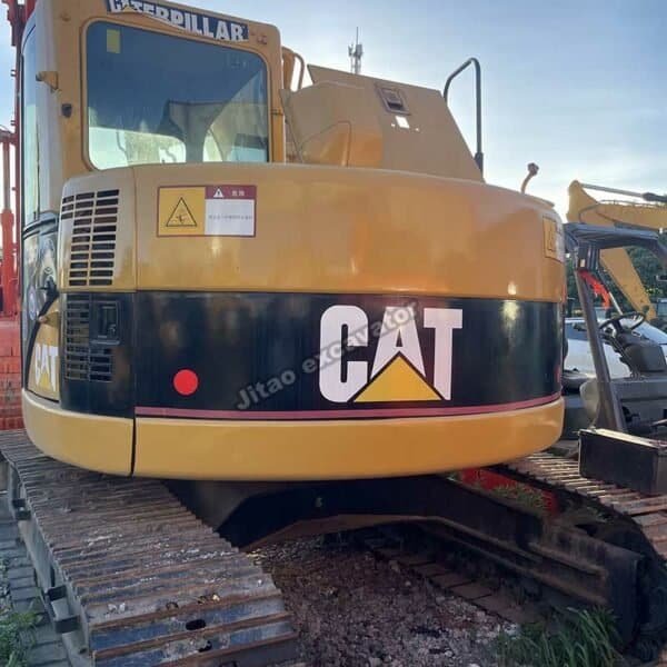 Cat 313C Rear Angle Rear view showing the counterweight and original Cat logo of the 313C unit.