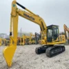 Certified PC200 Side View Perspective view of PC200, an ideal upgrade from a mini excavator used.