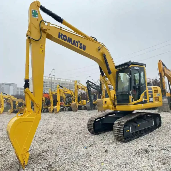 Certified PC200 Side View Perspective view of PC200, an ideal upgrade from a mini excavator used.
