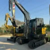 Side profile of the Volvo EC60C stock, highlighting premium used midi excavators for sale.
