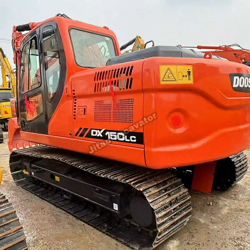 High-quality steel tracks and undercarriage of the Doosan DX150 crawler.