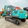 13-Ton Compact Power Side profile of the Kobelco SK130 showing its compact design and clean exterior.