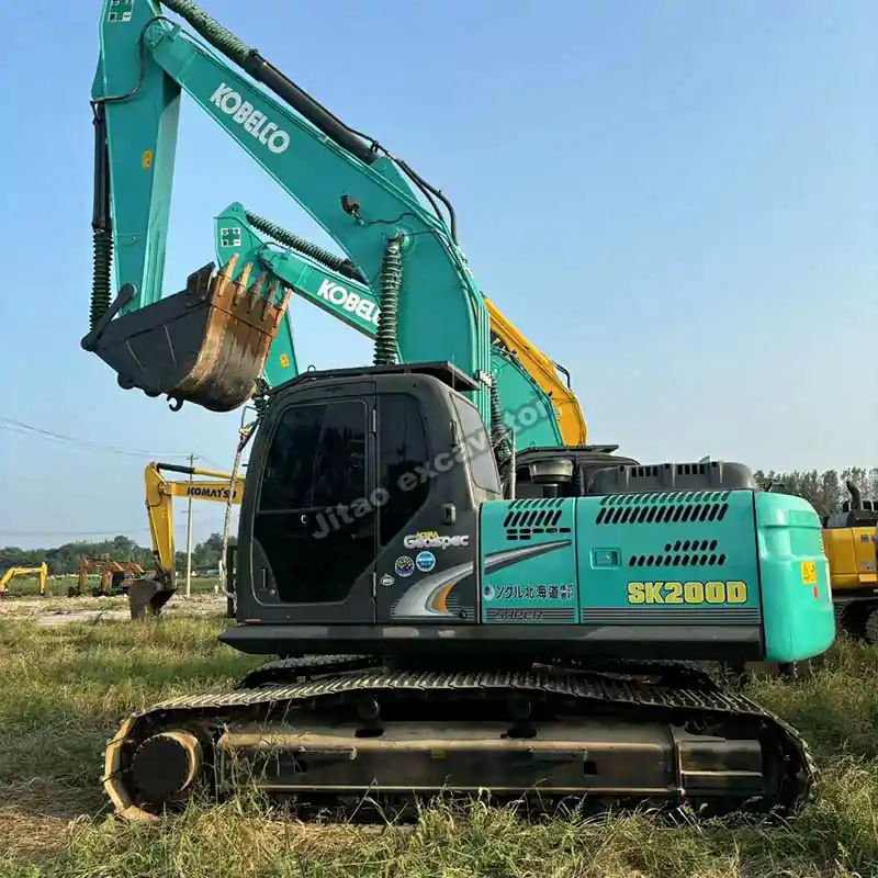 Side profile of the Kobelco SK200D showcased in Jitao's certified used chinese mini excavator for sale yard.