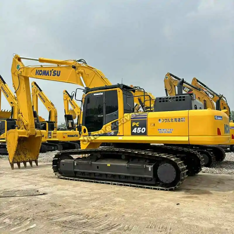 Side profile of the PC450, a top-tier used excavator near me option.