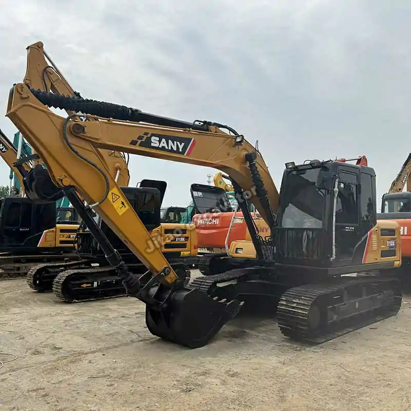 Angle view showing the boom and cabin of this used compact excavator model.