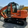 Side profile of our used excavator thumb for sale inventory.