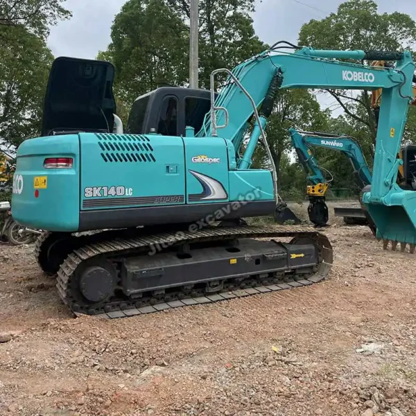 Front profile of a Kobelco SK140, a premium excavator for sale used with original components.
