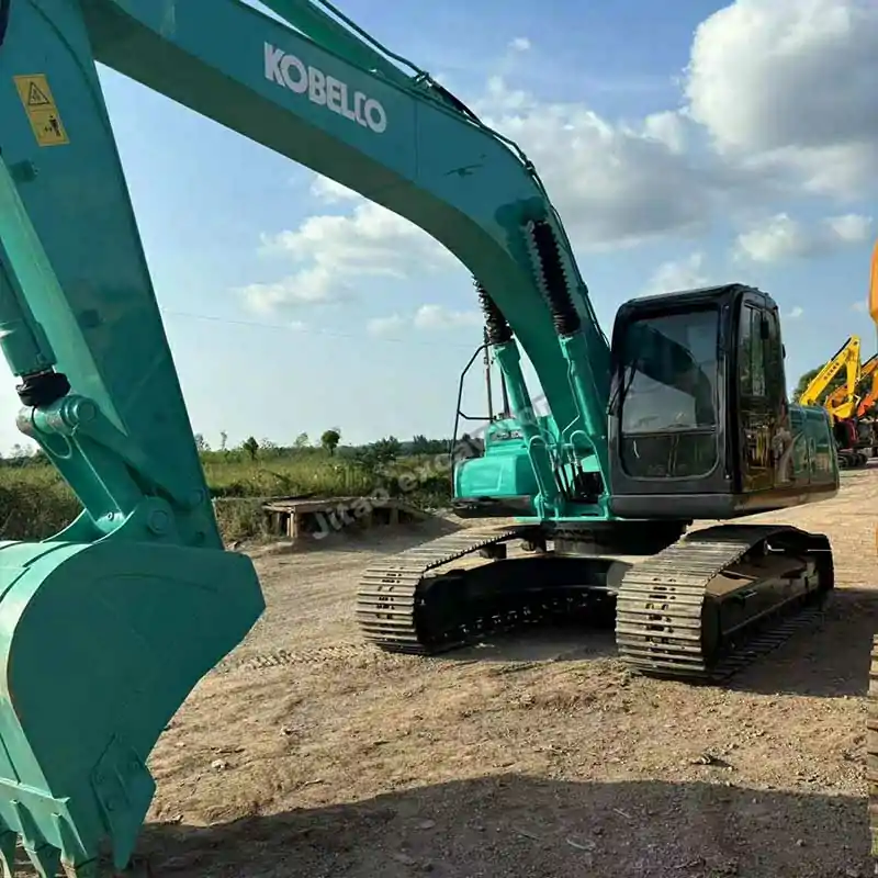 Front bucket detail of Kobelco SK260, part of Jitao's used mini excavator for sale fleet.