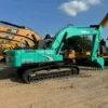 Side view of Kobelco SK260, a premium choice for those seeking a used mini excavator for sale.
