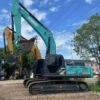 Side profile of Kobelco SK350D, a premium choice among our used excavators.