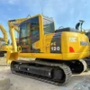 Side view of Komatsu PC120, a premium choice for used mini excavators for sale near me.