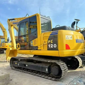 Komatsu PC120 Side View Side view of Komatsu PC120, a premium choice for used mini excavators for sale near me.