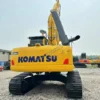 PC240LC Rear Stability Rear view of Komatsu PC240LC, highlighting durability for any used komatsu excavator buyer.