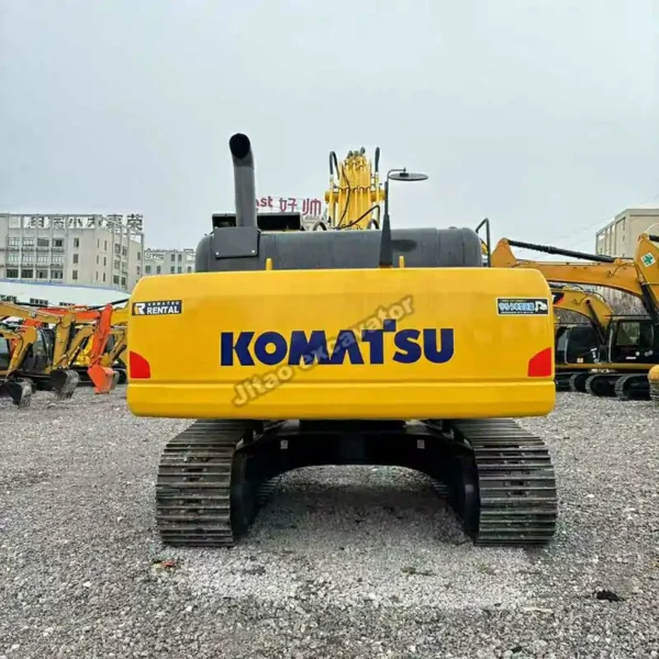 PC300 Rear Detail Rear view of Komatsu PC300 showing counterweight integrity for high-quality excavators used.